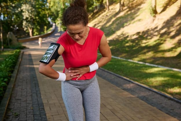 A close-up of a runner holding their stomach in discomfort, symbolizing common exercise-induced gastrointestinal distress, with a background of a blurry race track. Evokes empathy and problem.