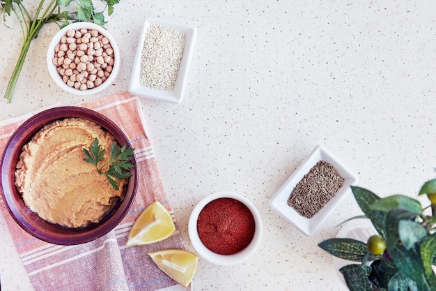 A detailed flat lay of various iron-rich foods (spinach, red meat, lentils) alongside an iron supplement bottle, emphasizing dietary and supplemental sources.