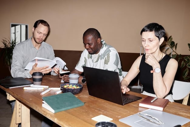 A team of diverse professionals in a meeting room, intensely discussing compliance documents and label designs for dietary supplements, with laptops and whiteboards.