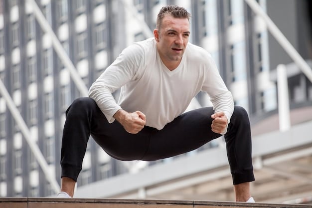 A man performing perfect form leg raises on a yoga mat, showcasing strong abdominal engagement and a calm, focused expression.
