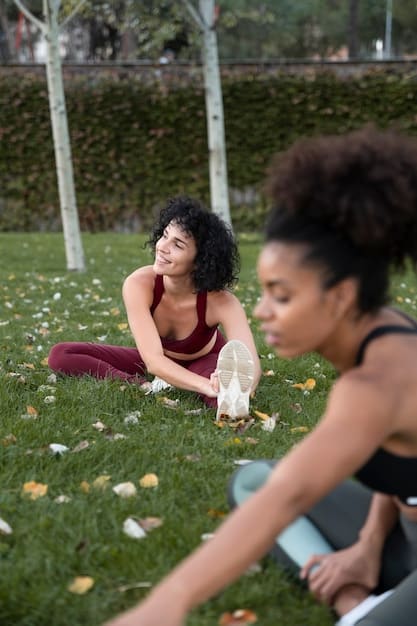 A diverse group of people participating in an outdoor HIIT class, performing various exercises like burpees and lunges with enthusiastic expressions, showing community and fitness.