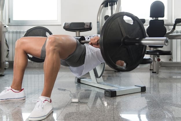 An athlete performing hip thrusts with a barbell on their hips, demonstrating strong glute engagement.