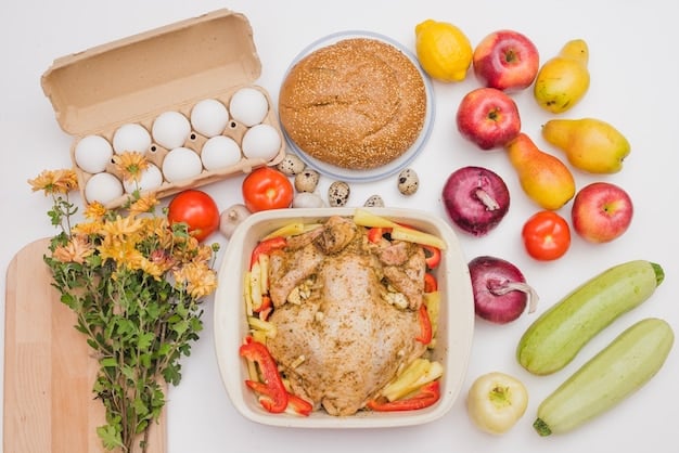 A detailed flat lay of nutritious post-workout food, including protein sources, complex carbohydrates, and fresh fruits, alongside a glass of water.