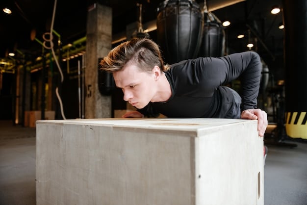 A person performing a box jump, mid-air, with a focus on their powerful leg drive and determined expression in a well-lit gym.