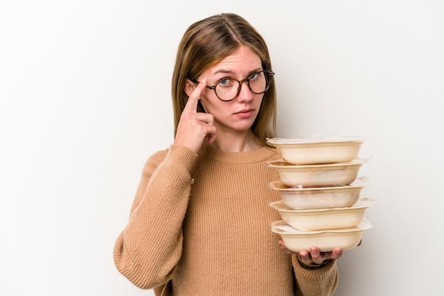 A person looking perplexed while trying to manage a large number of food containers, symbolizing the challenges of meal prep and timing with intermittent fasting.
