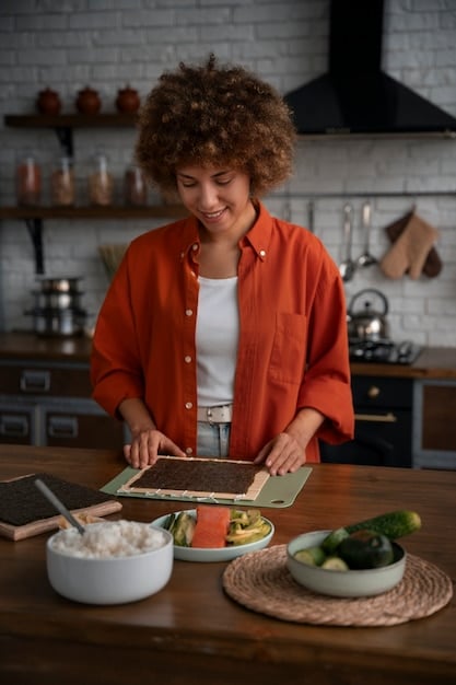 A person preparing meals in a kitchen, with various containers filled with healthy food like chicken, vegetables, and rice, symbolizing meal preparation and planning.