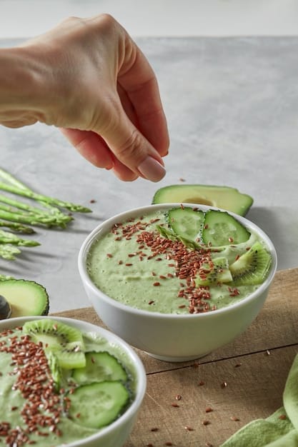 A vibrant smoothie bowl with a blend of spinach, banana, plant-based protein powder, and topped with berries, chia seeds, and sliced almonds. The setting is clean and modern, highlighting healthy eating.