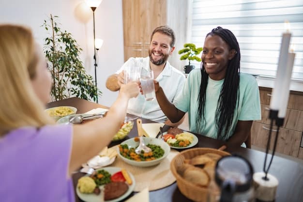A diverse group of friends sharing healthy meals and laughing together, symbolizing social support and positive reinforcement for nutrition goals.