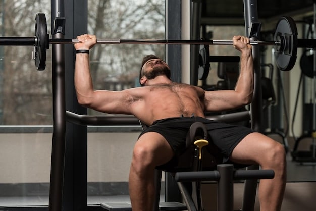 A man performing a close-grip bench press, focusing on hand placement and triceps engagement, with proper form.